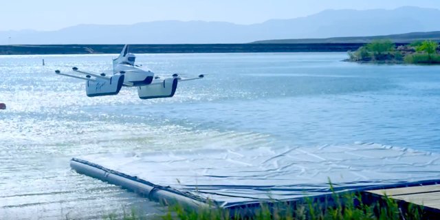 drone hovering over water