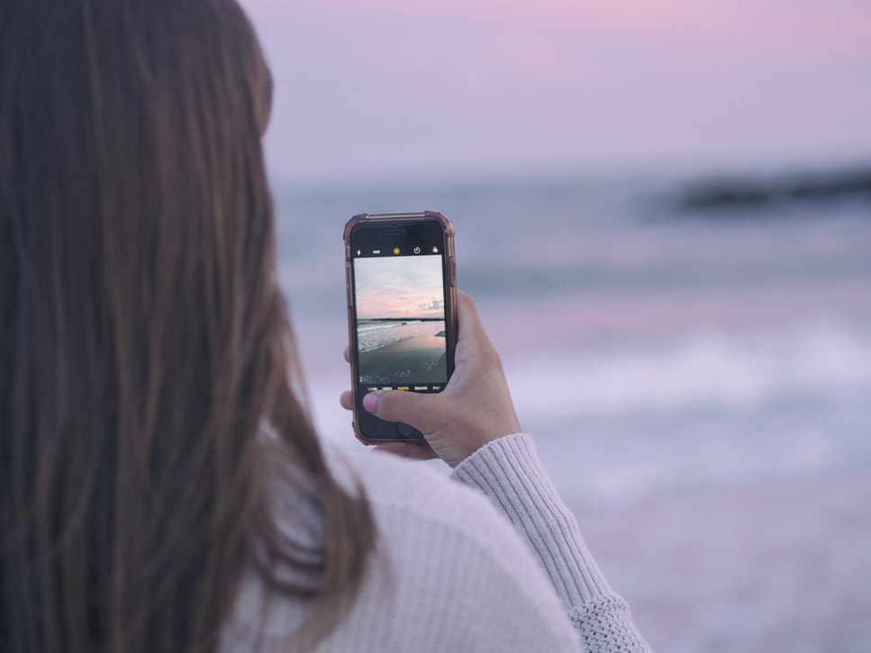iPhone on beach Unsplash iPhone on beach Unsplash
