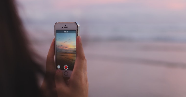 iPhone on beach fb Unsplash iPhone on beach fb Unsplash