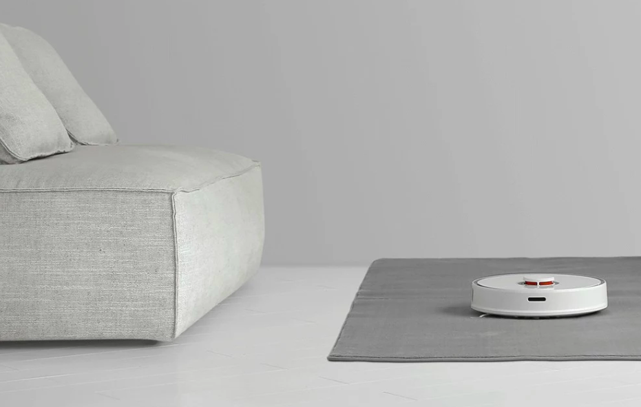 robot vacuum on rug