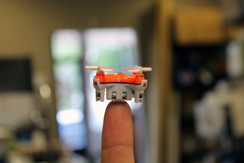 tiny drone on finger