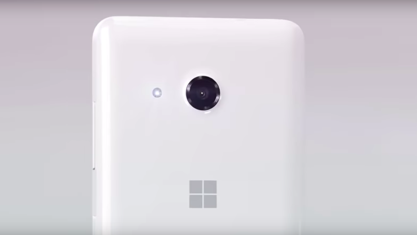 white smartphone back camera