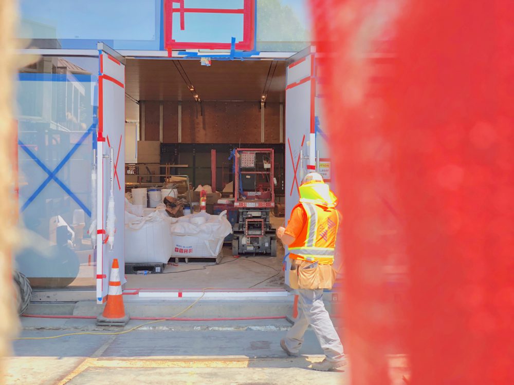 worker entering construction site
