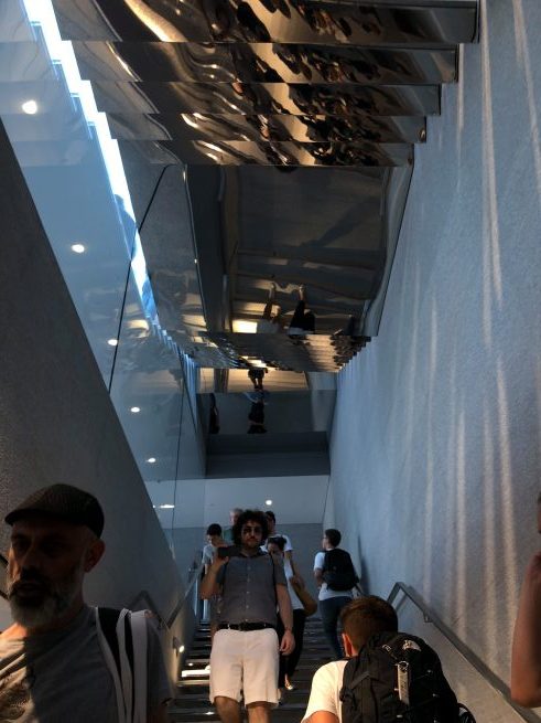 ascending staircase with people