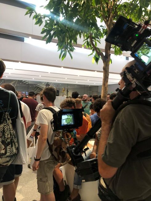 camera crew filming crowd