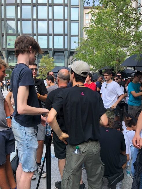 crowd gathered outside building