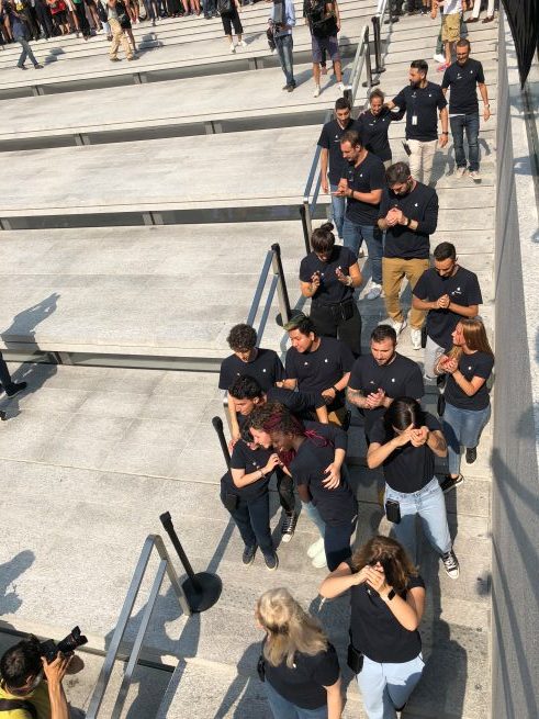 people walking down steps