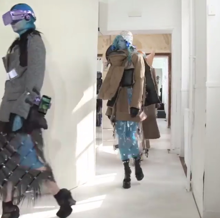 runway models with tech accessories