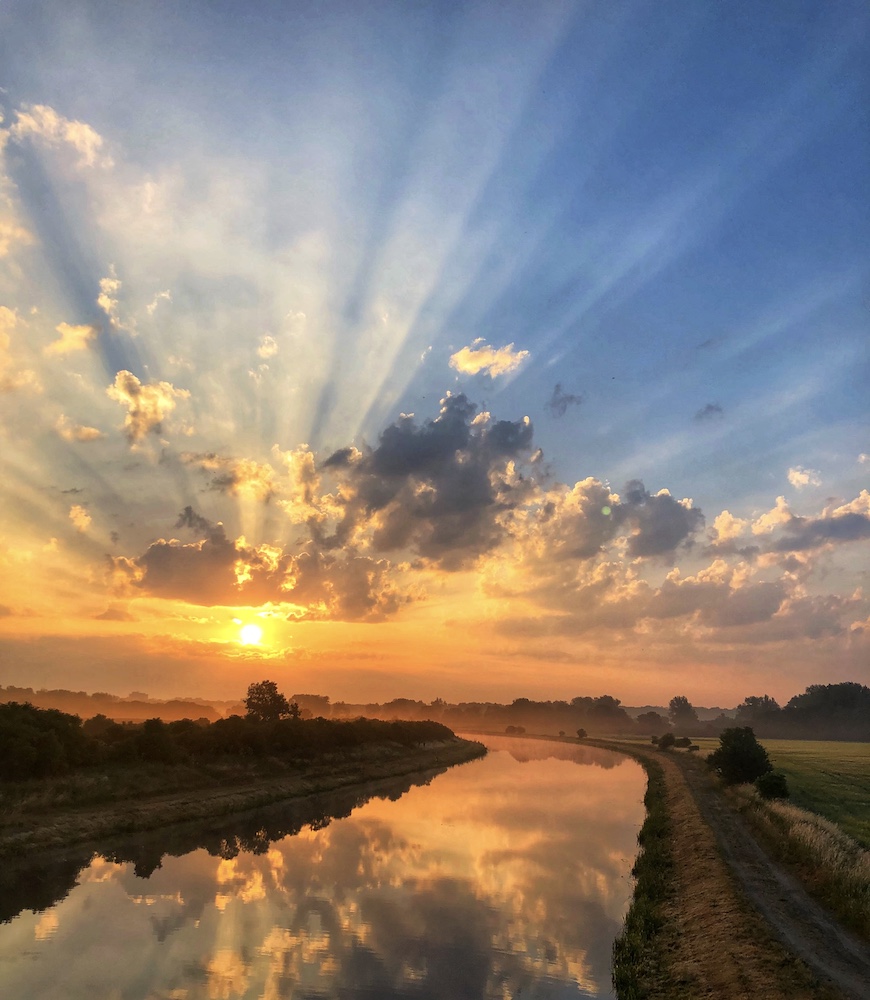 sunrise river reflection