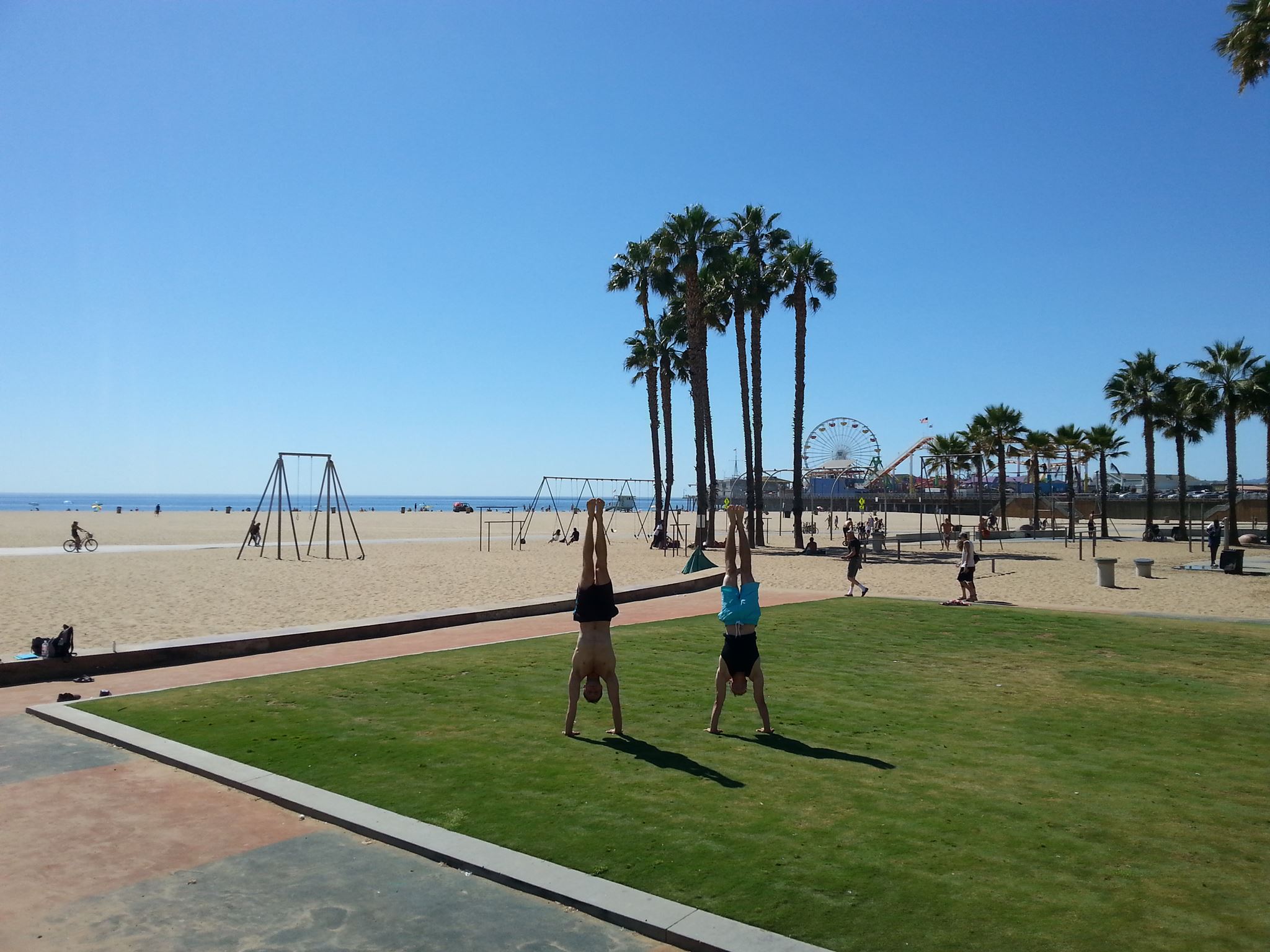 beach handstand group