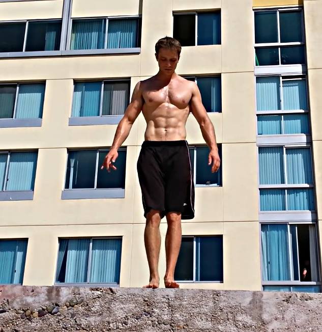 man standing building background