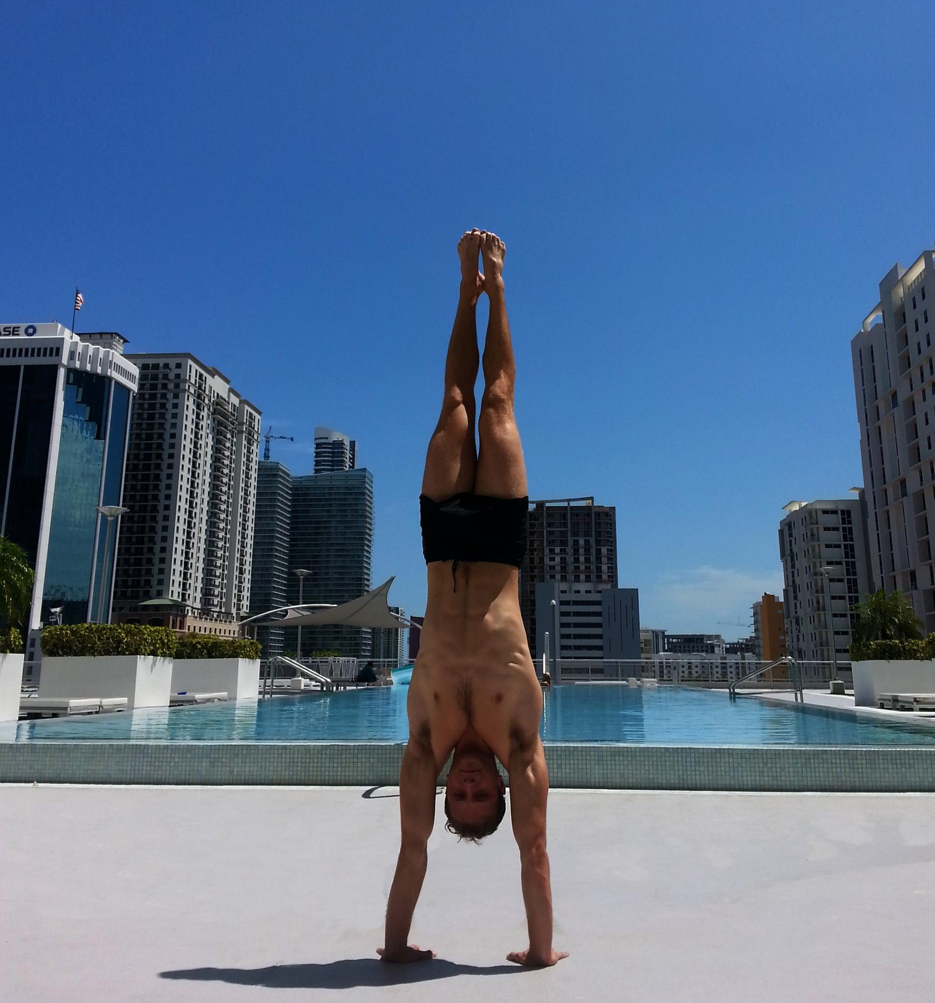 rooftop handstand cityscape