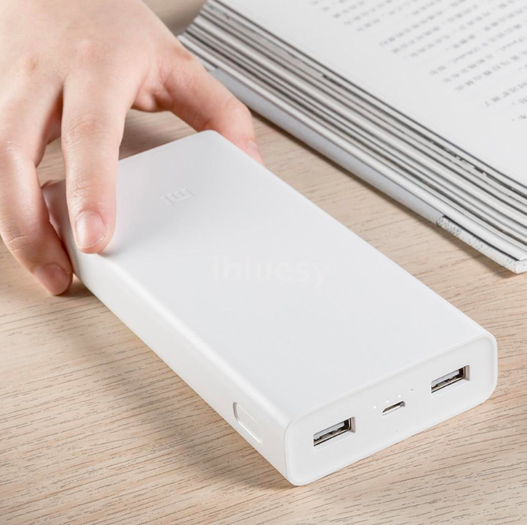 hand using white power bank