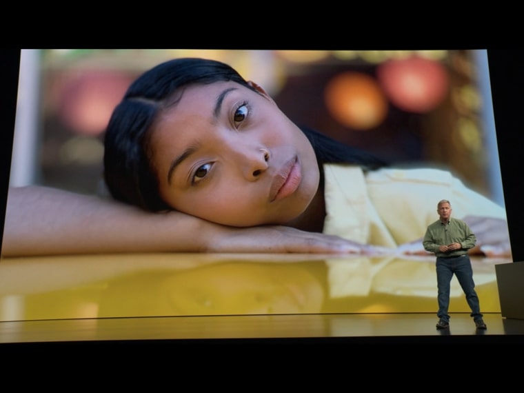 portrait leaning on table