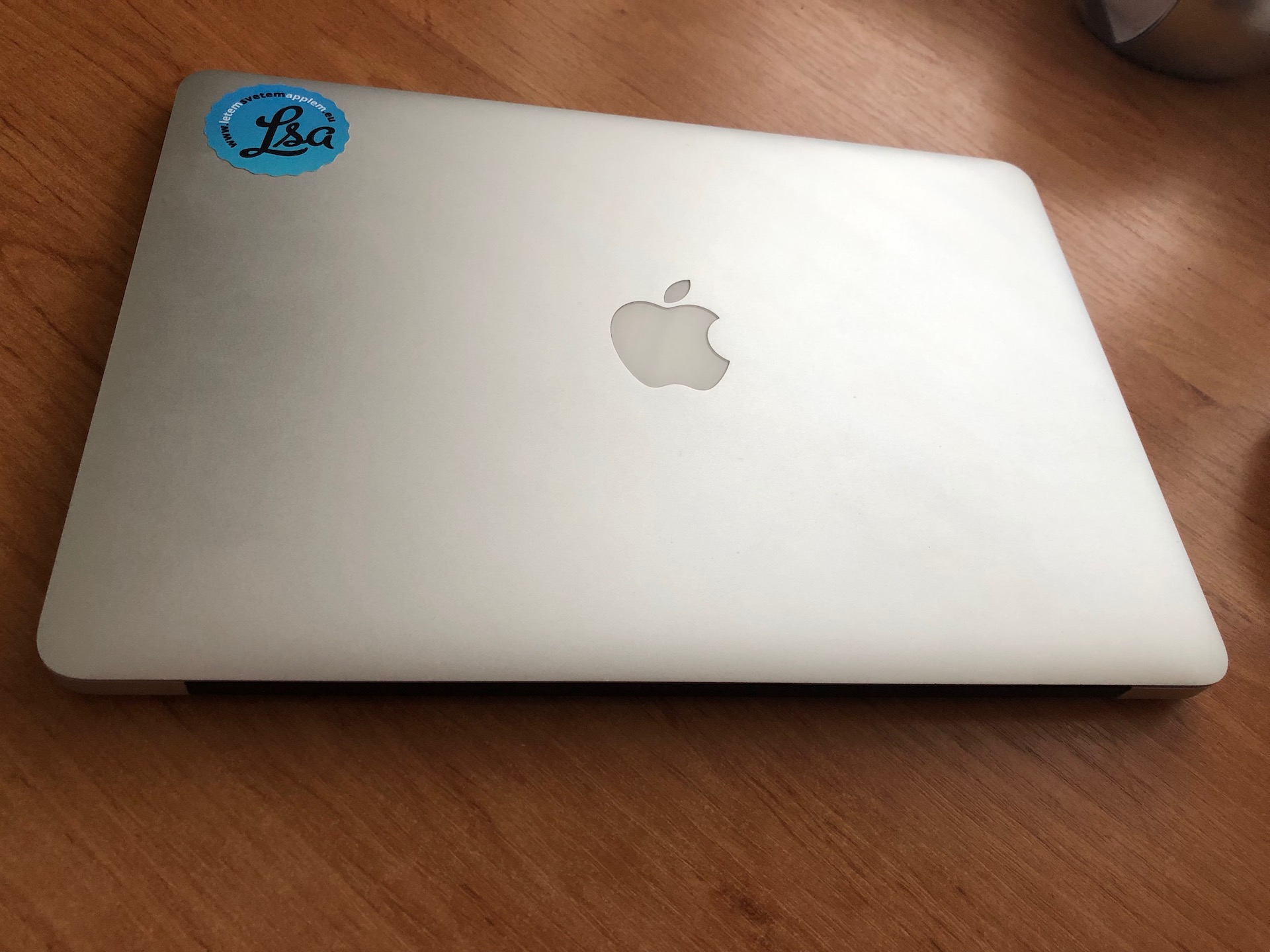 closed macbook on desk