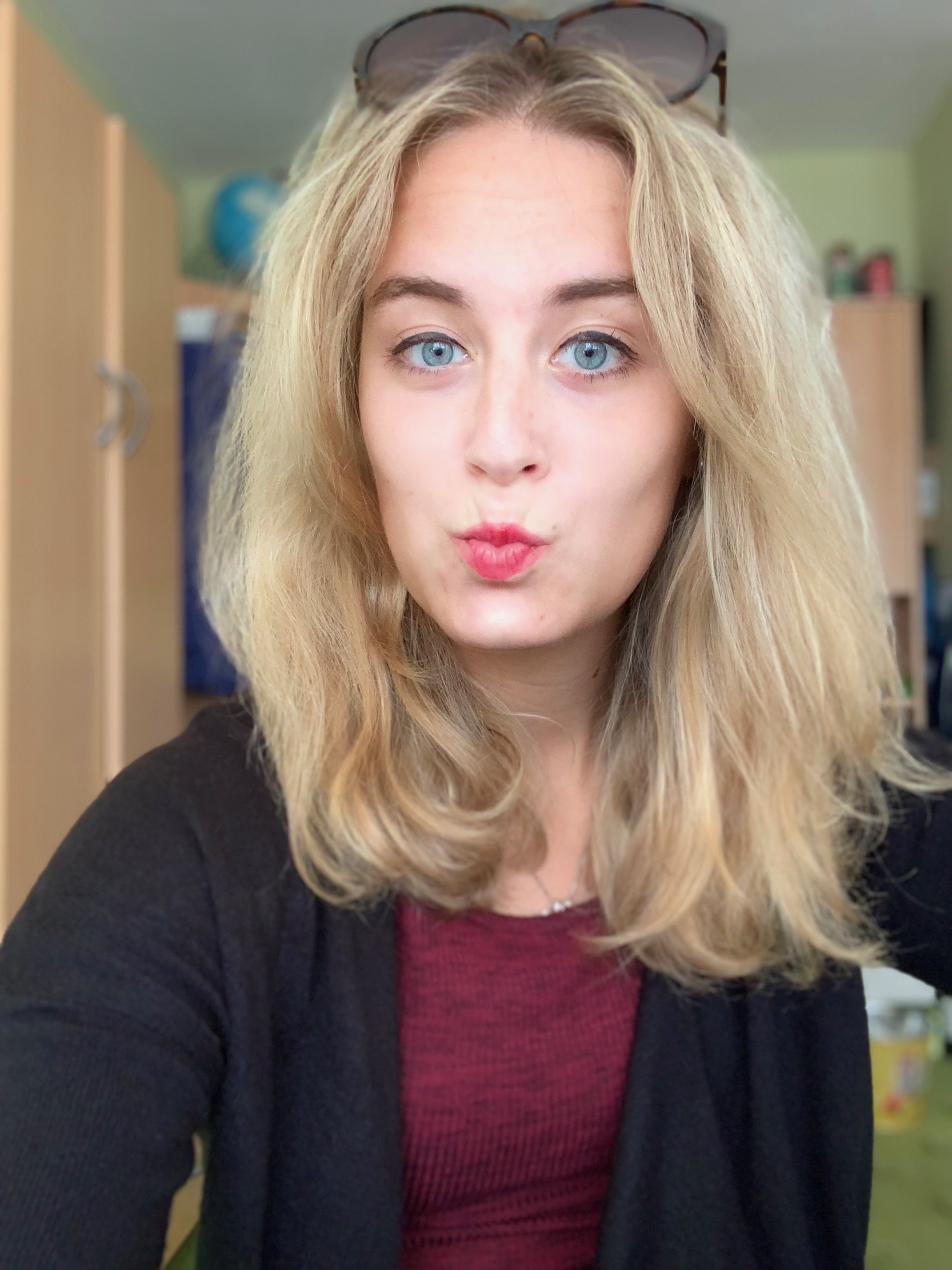 person blonde hair pouting