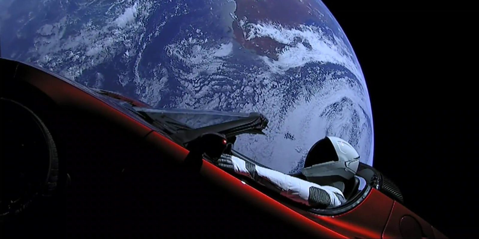 car in space earth view