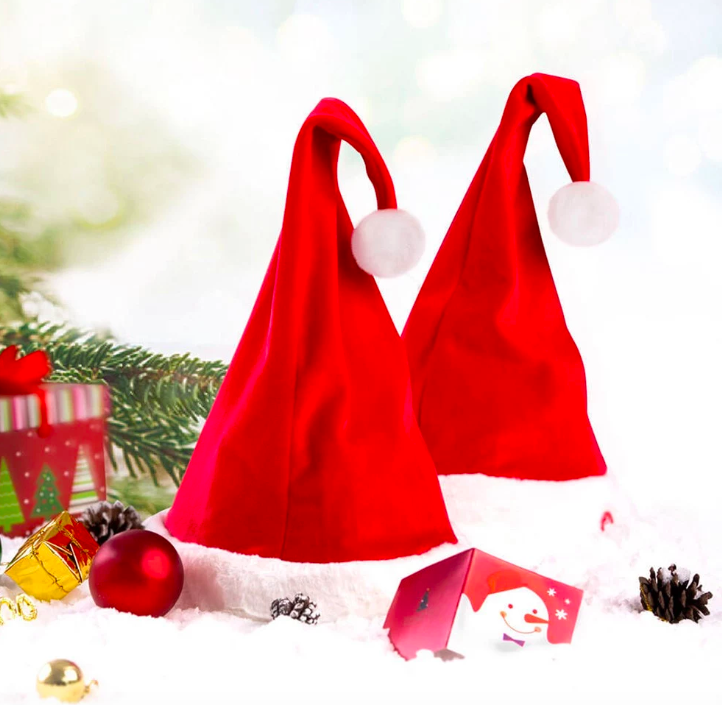 christmas santa hats in snow