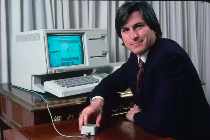 person with vintage computer