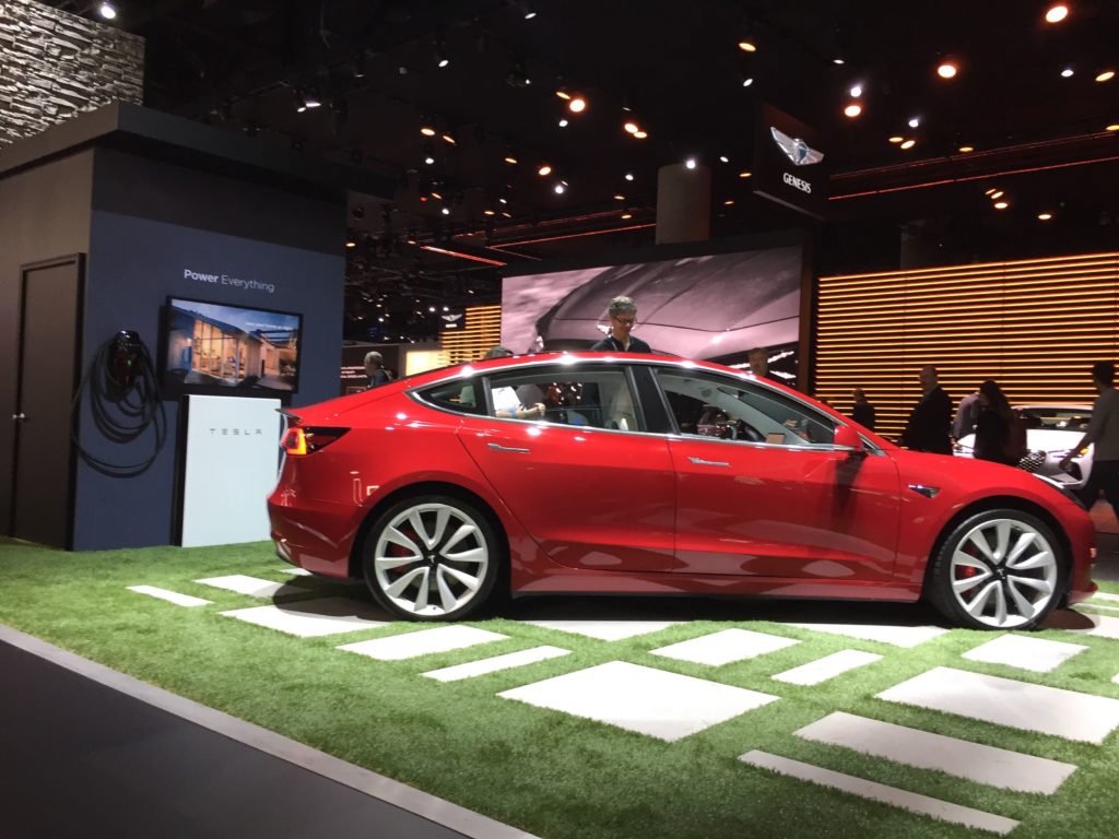 red electric car side view