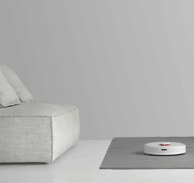 robot vacuum on rug