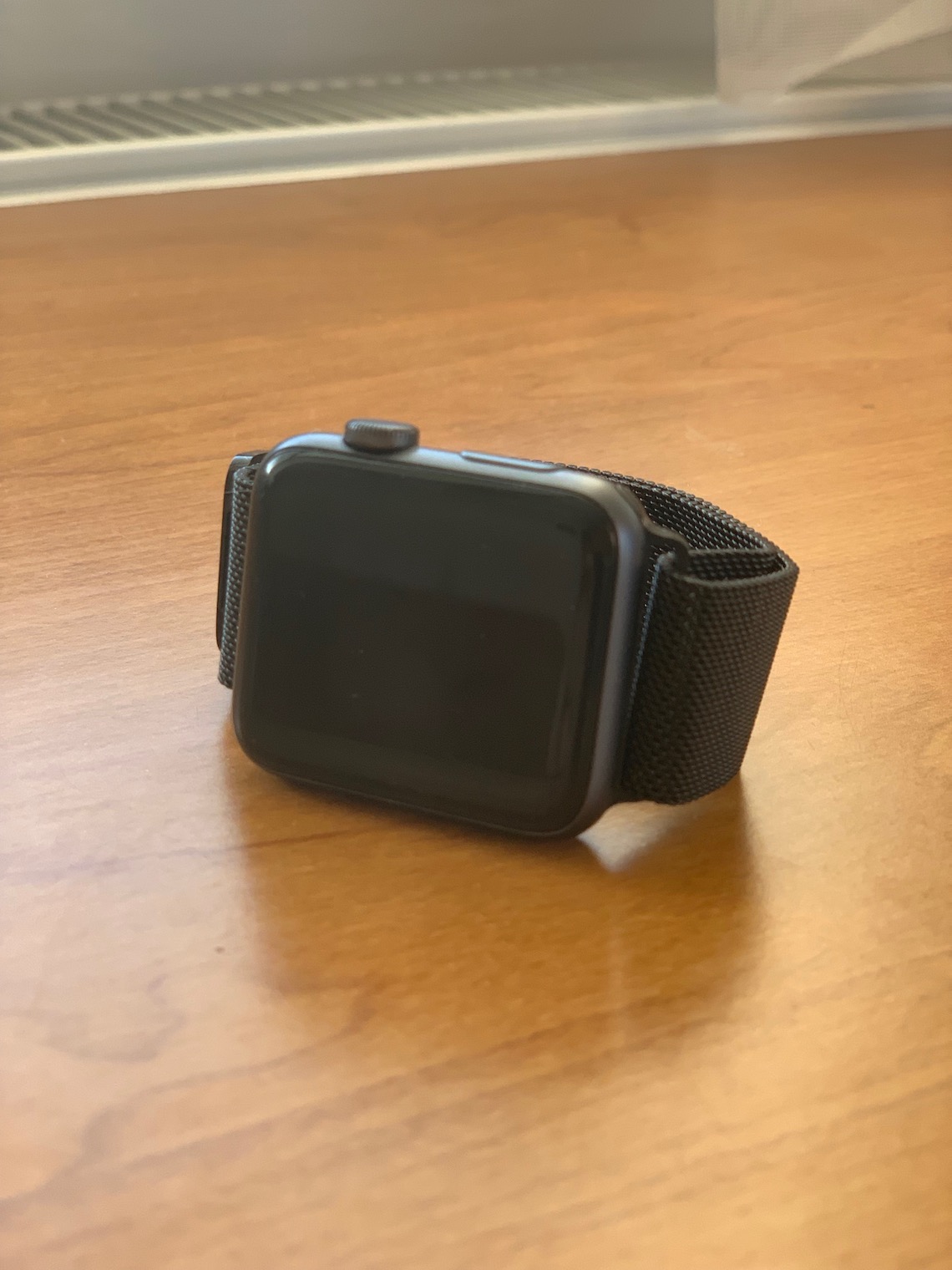 black smartwatch on table