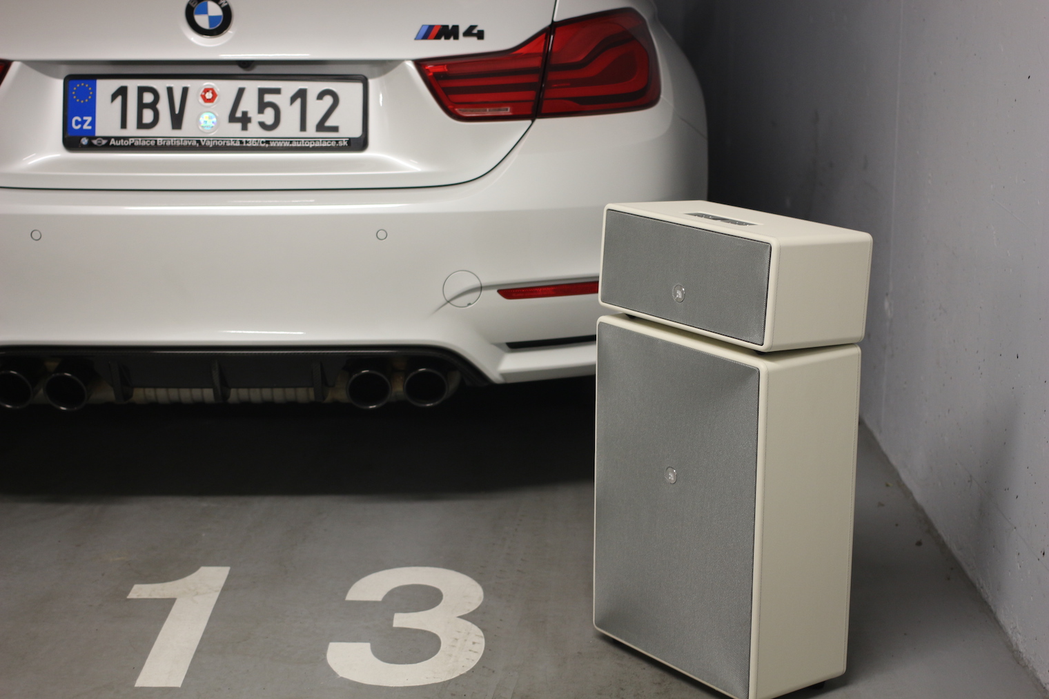 car and speaker in garage 3