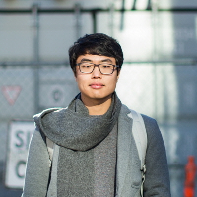 person in scarf and glasses