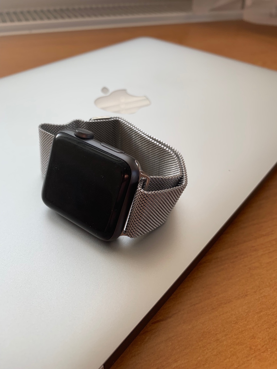 smartwatch on laptop