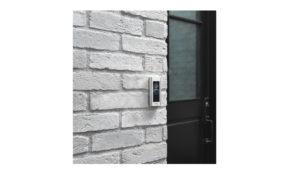 video doorbell on brick wall