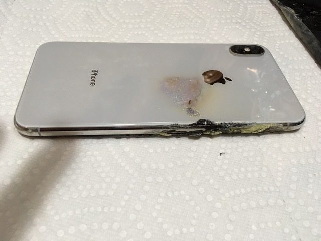 damaged iphone on paper towel
