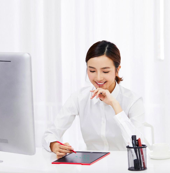 person using writing tablet