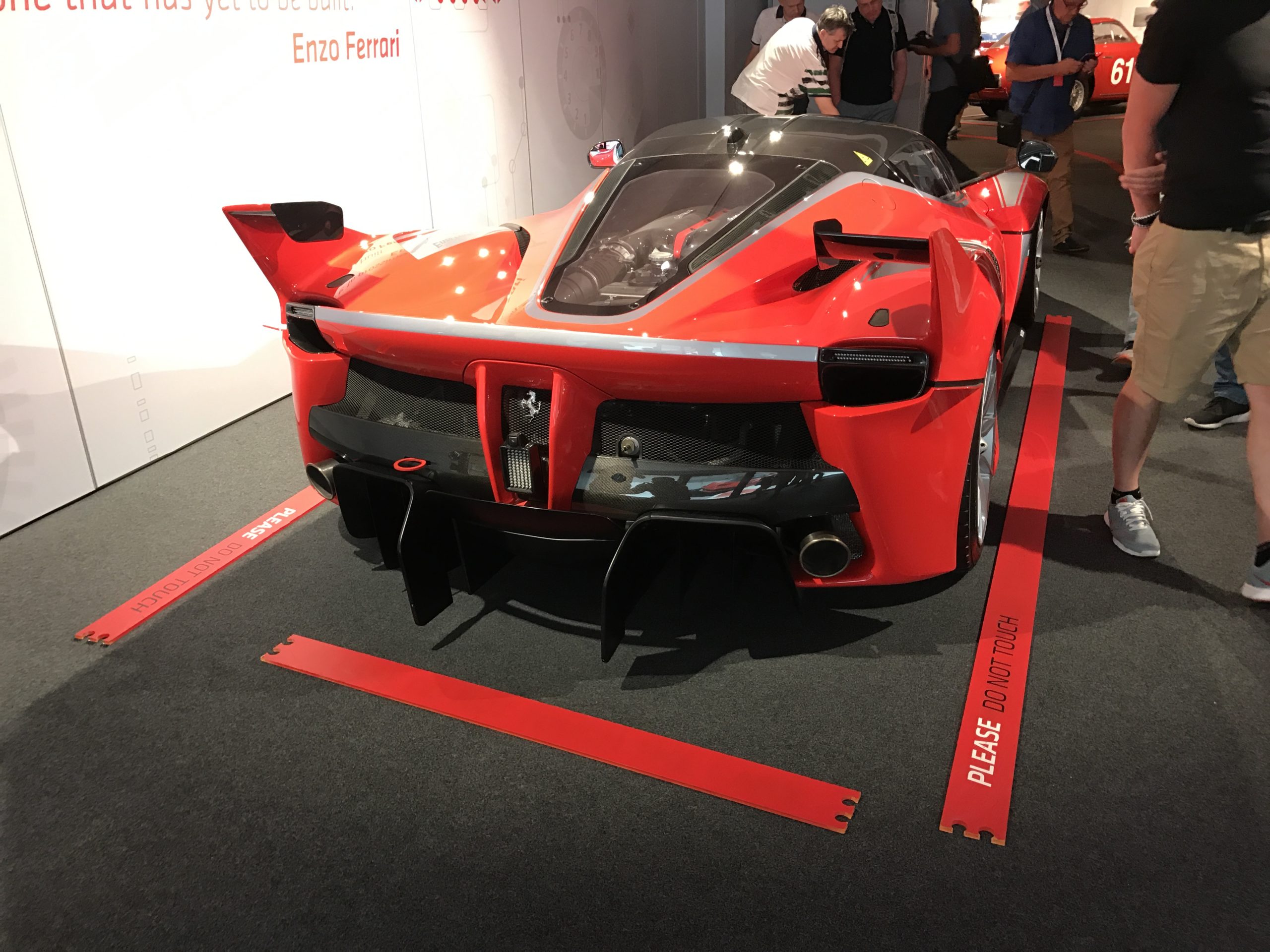 red ferrari supercar rear view