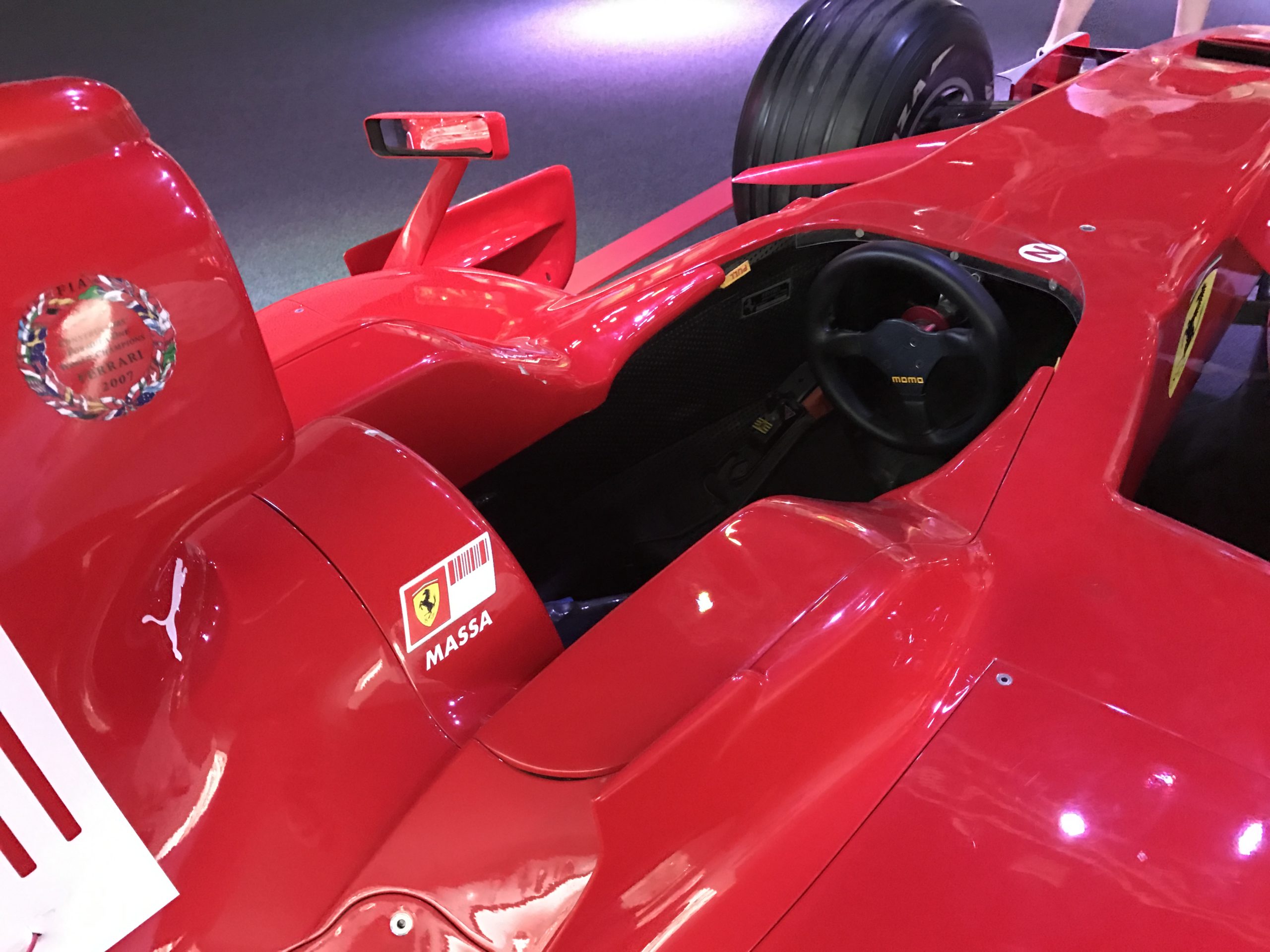 red formula one car cockpit closeup
