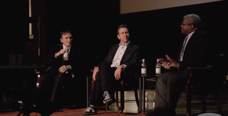 three men conference panel