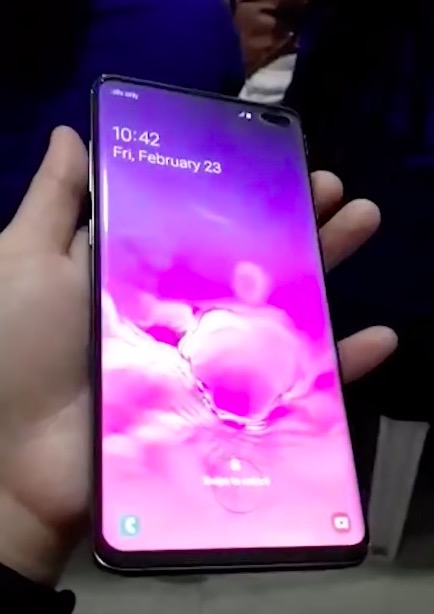 hand holding smartphone display