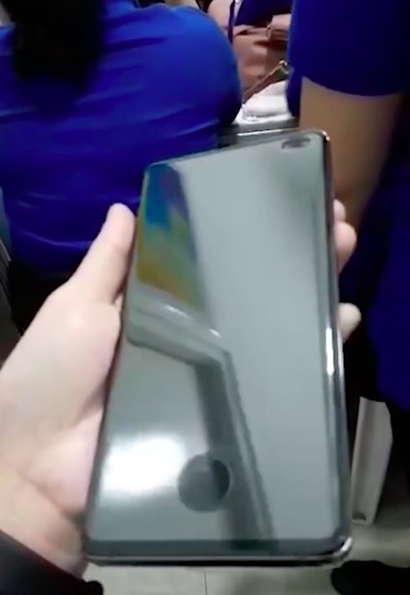 hand holding smartphone screen off