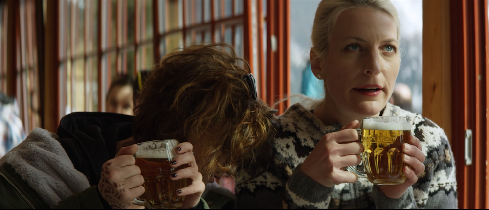 people drinking beer in cafe