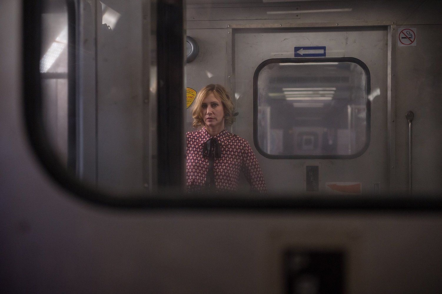 woman standing in train