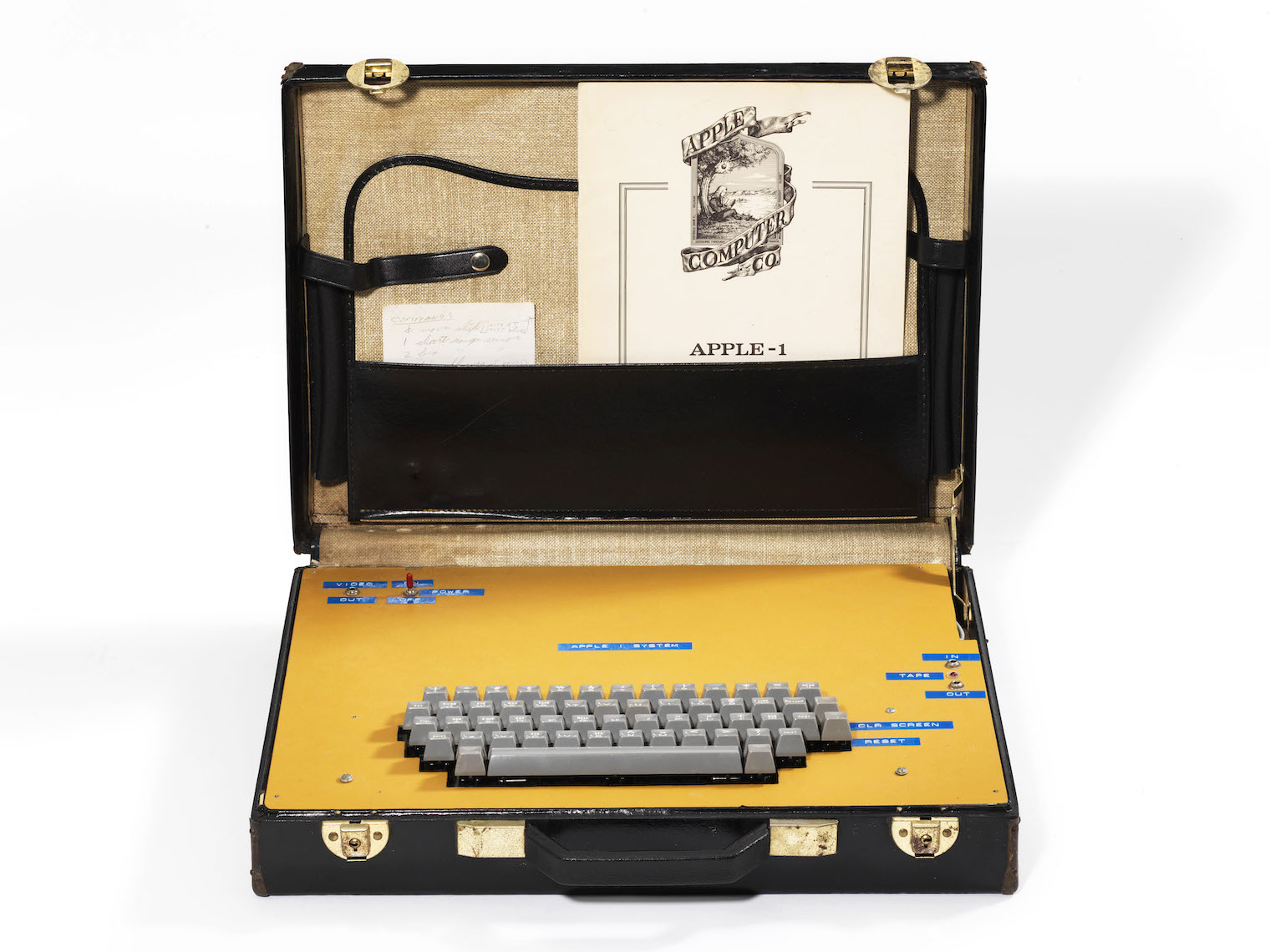 apple 1 computer with documents