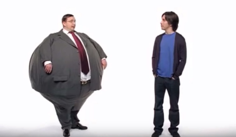 large suit person next to casual person