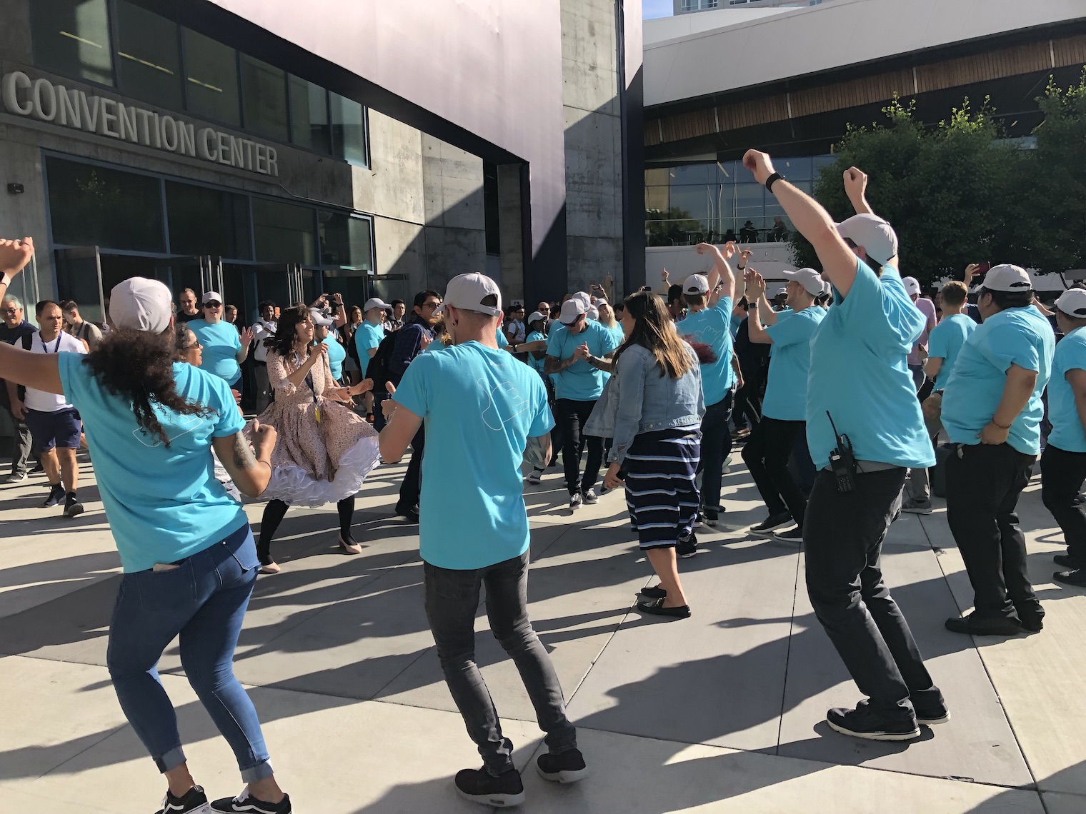 group dancing outside convention center