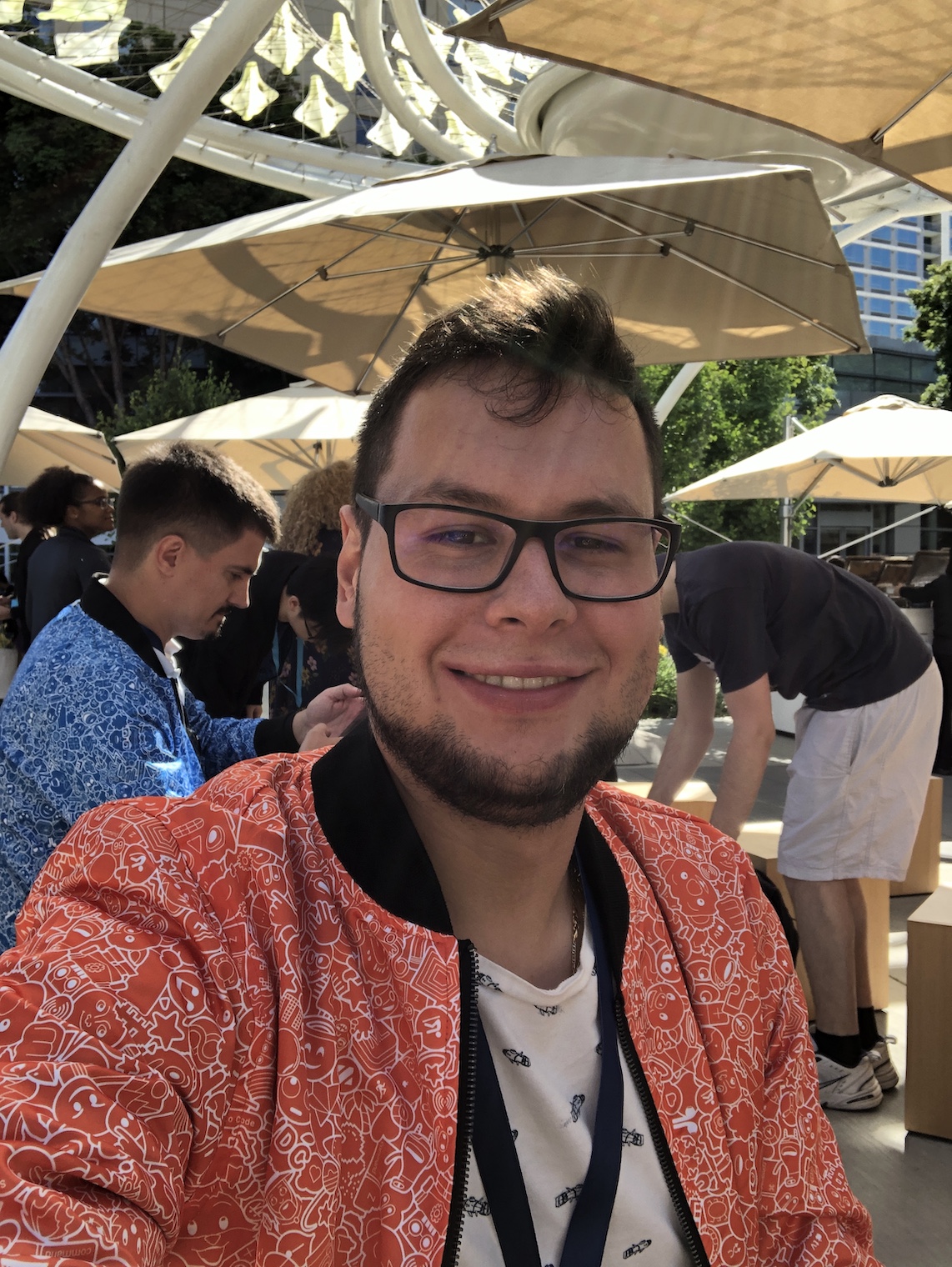 man smiling outdoor event