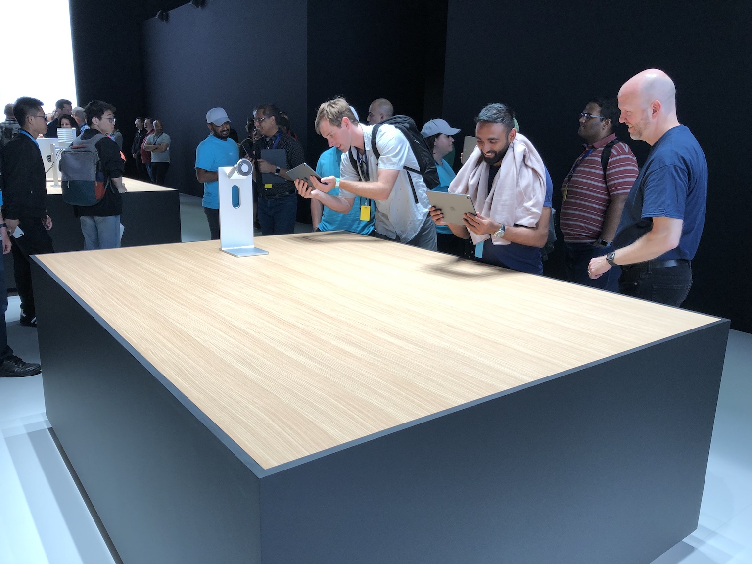 people viewing tech display