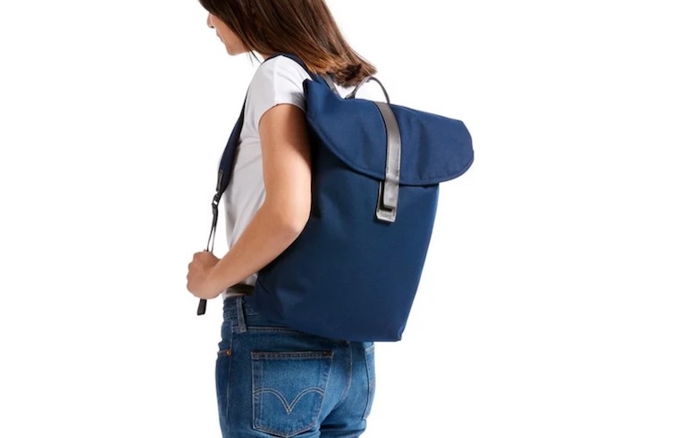 person wearing blue backpack