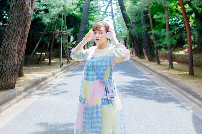 woman wearing headphones outdoors