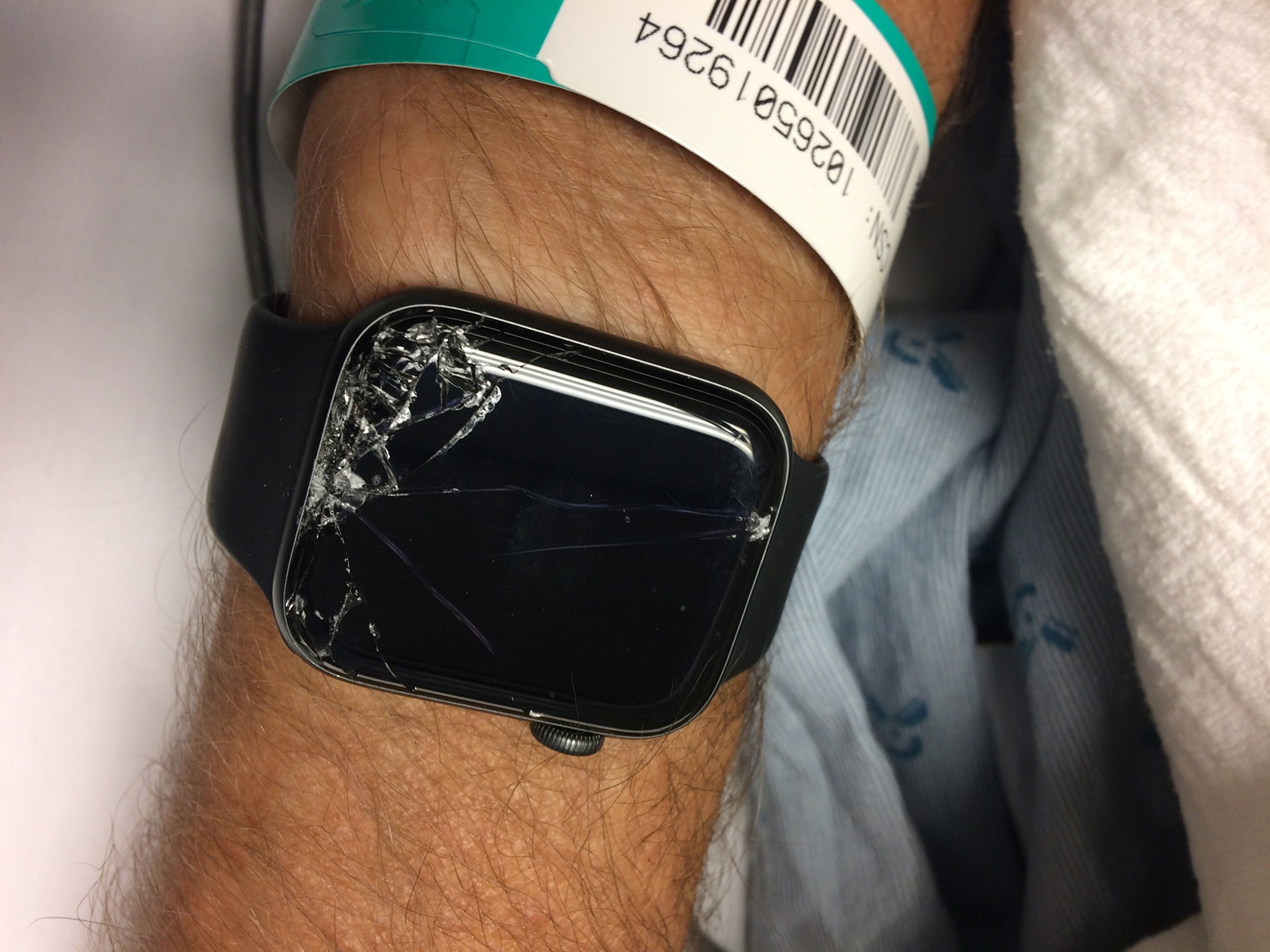 cracked smartwatch on wrist