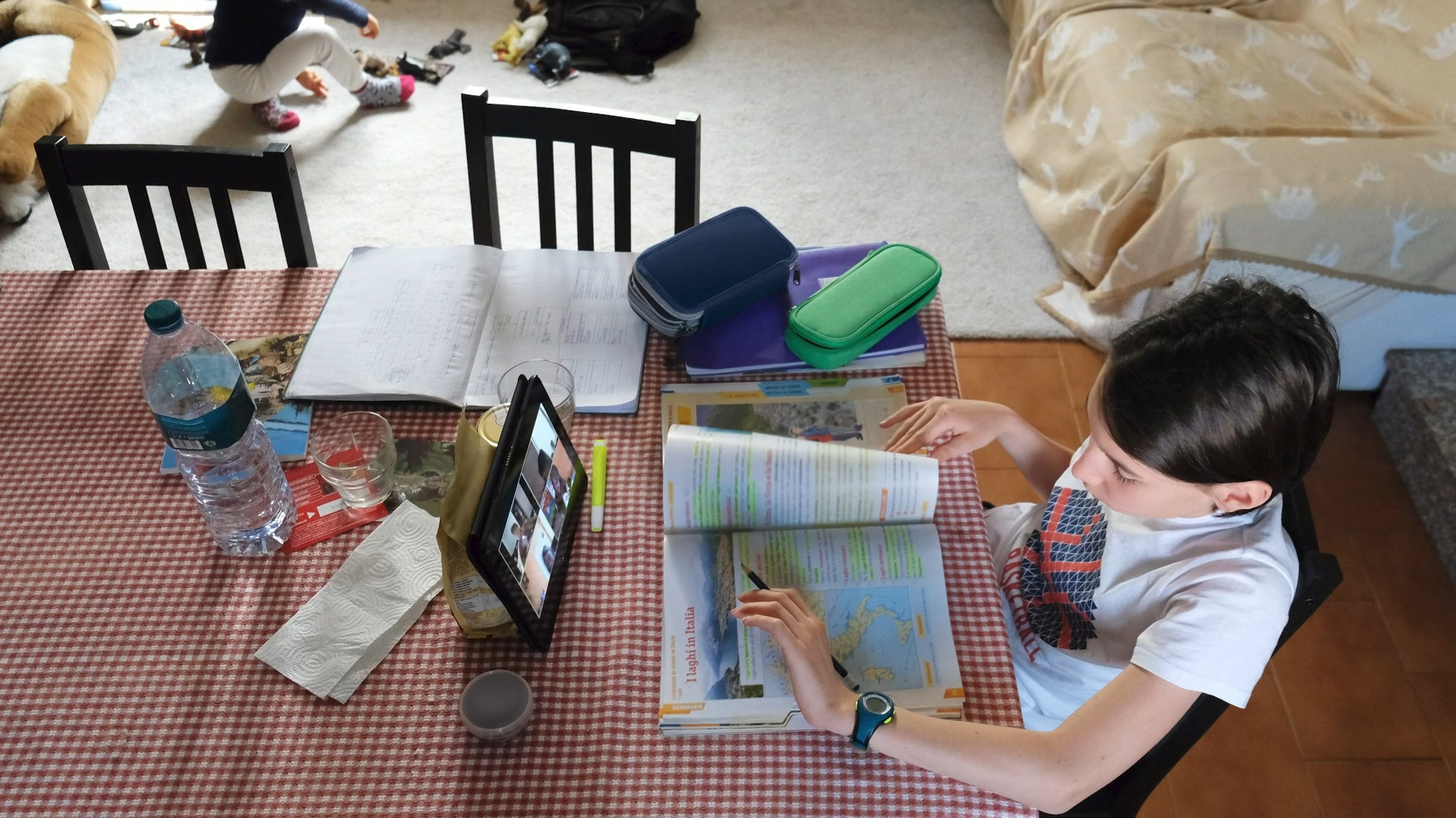 child studying with tablet
