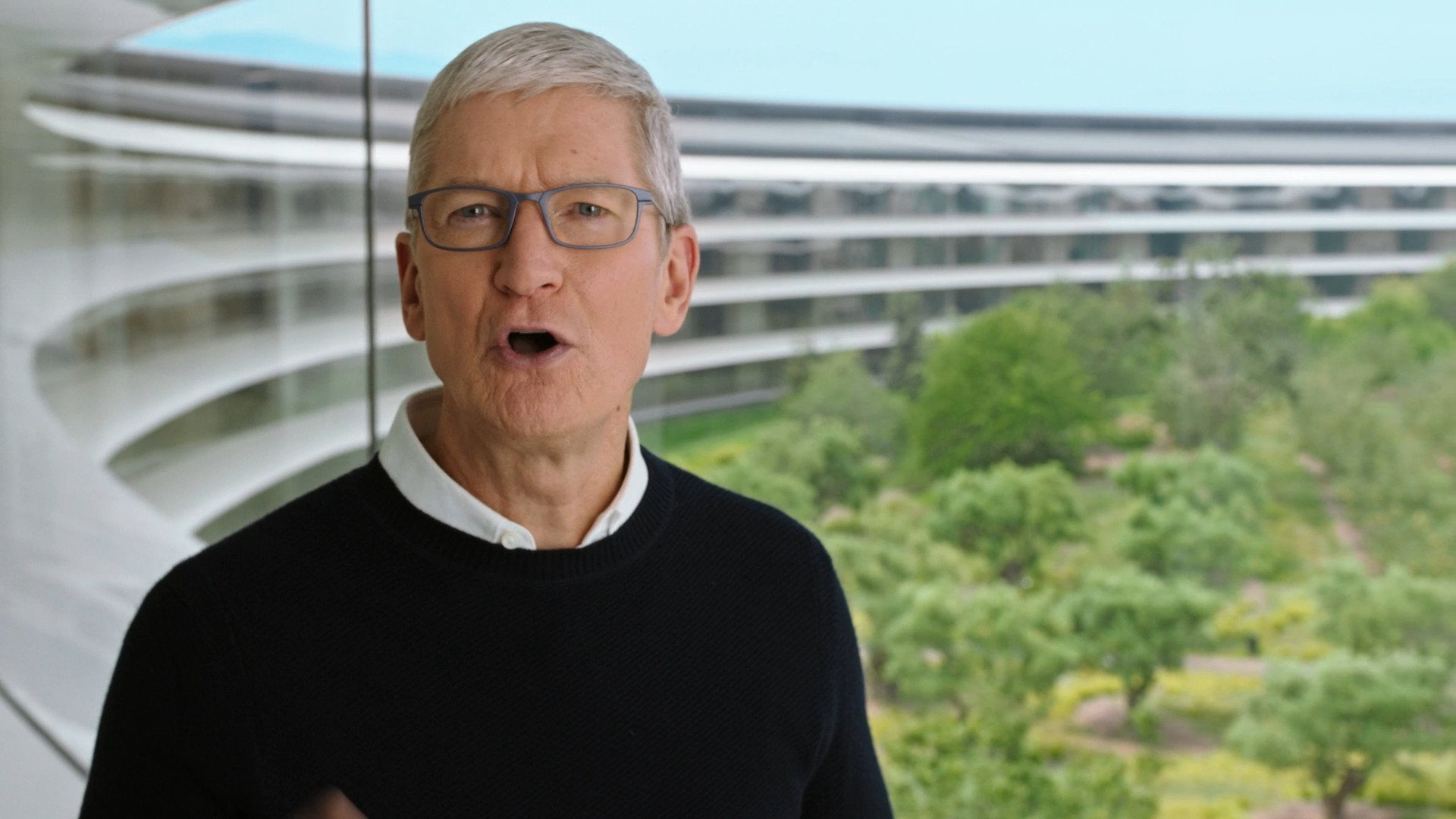 man speaking at modern building