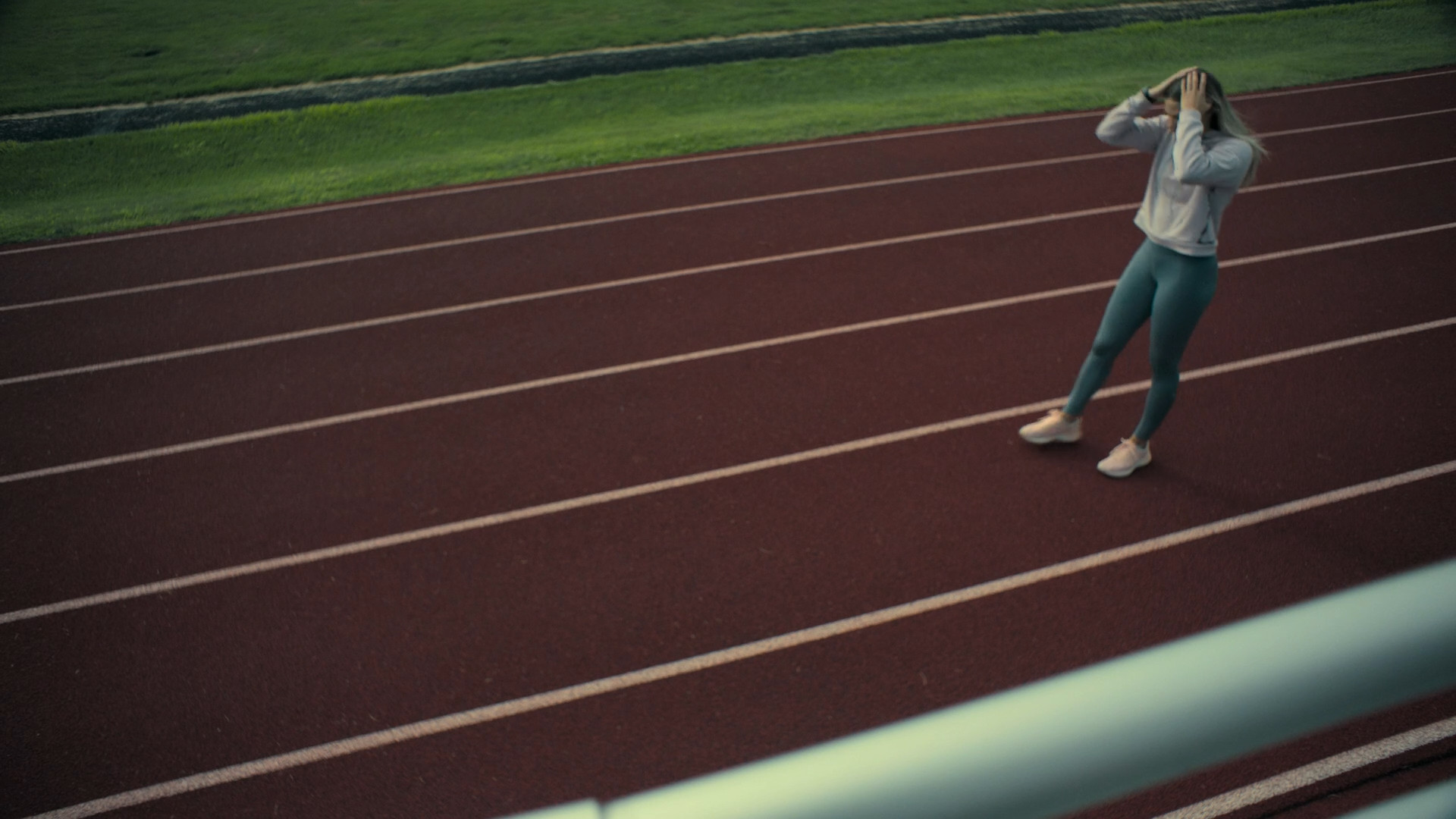 woman on running track